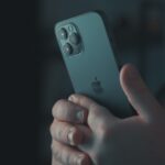 person holding silver iphone 6